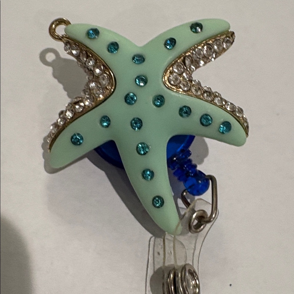 rhinestone starfish badge reel